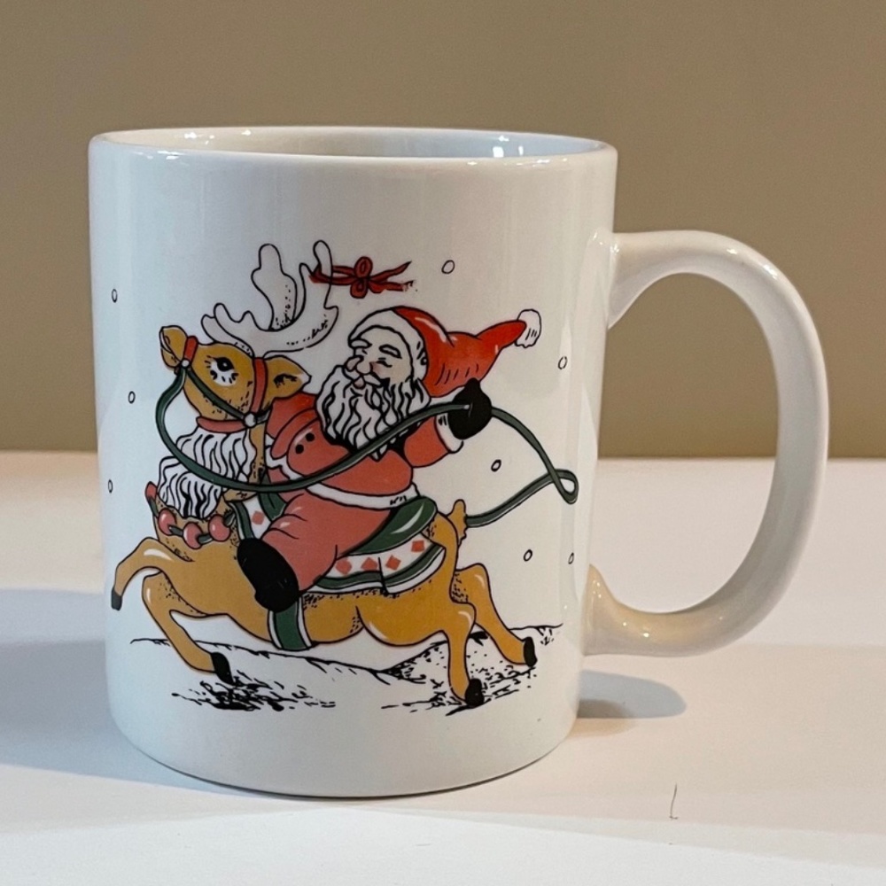 Santa Riding Reindeer Christmas Mug